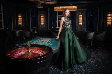 A player using their smartphone during a festive local event, representing 6777DET’s fully mobile-friendly casino.